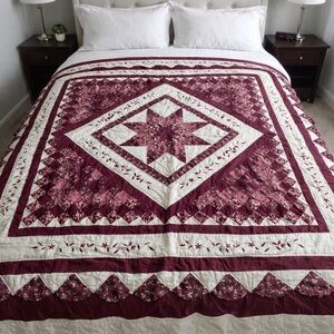 Handmade patchwork quilt with embroidery details